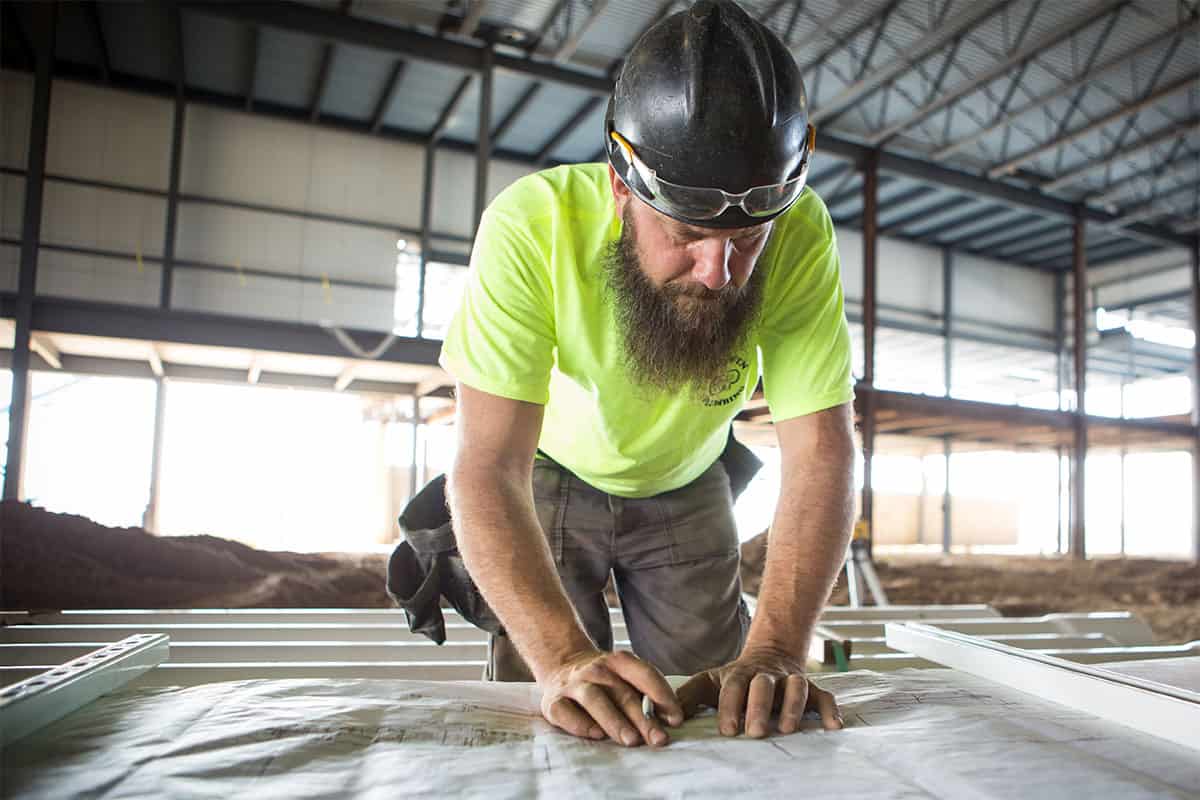 Man reading blueprints